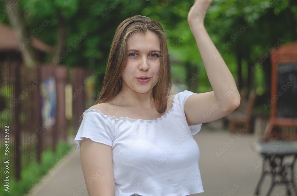 Portrait of a young beautiful girl with long hair and blue eyes Portrait of a young beautiful girl with long hair and blue eyes