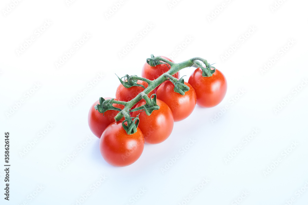 Top view of branch tomatoes isolated on white background. Top view of branch tomatoes isolated on white background.