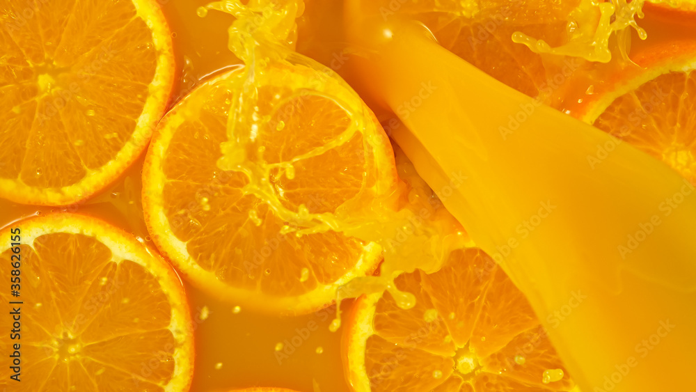 Freeze motion of pouring orange juice. Top view, close-up. - obrazy, fototapety, plakaty 