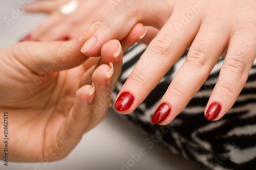 Manicure with red nails