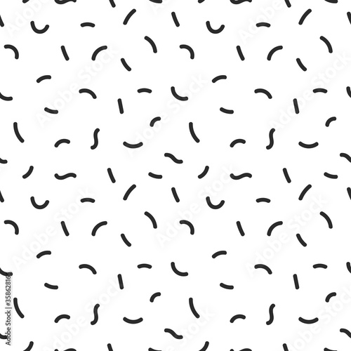 Seamless pattern with short wavy lines  in doodle style. Black and white line art. Design template for wallpaper  wrapping  fabric  textile  web  banner  poster.