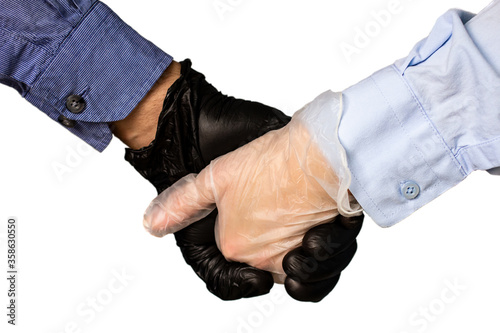 people hold hands in gloves. medical gloves as a means of personal protection