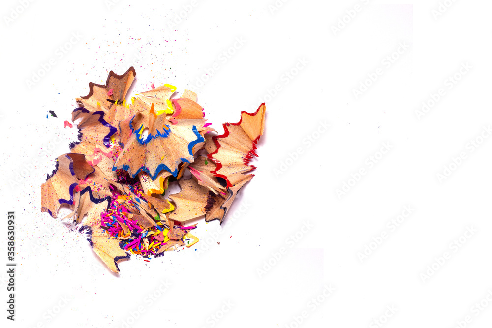 Colorful bright pencil chips on a white background. chip from sharpener. Colorful bright pencil chips on a white background. chip from sharpener.