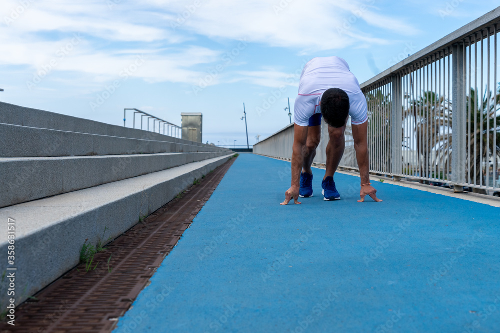 Young man running, motivation concept Young man running, motivation concept
