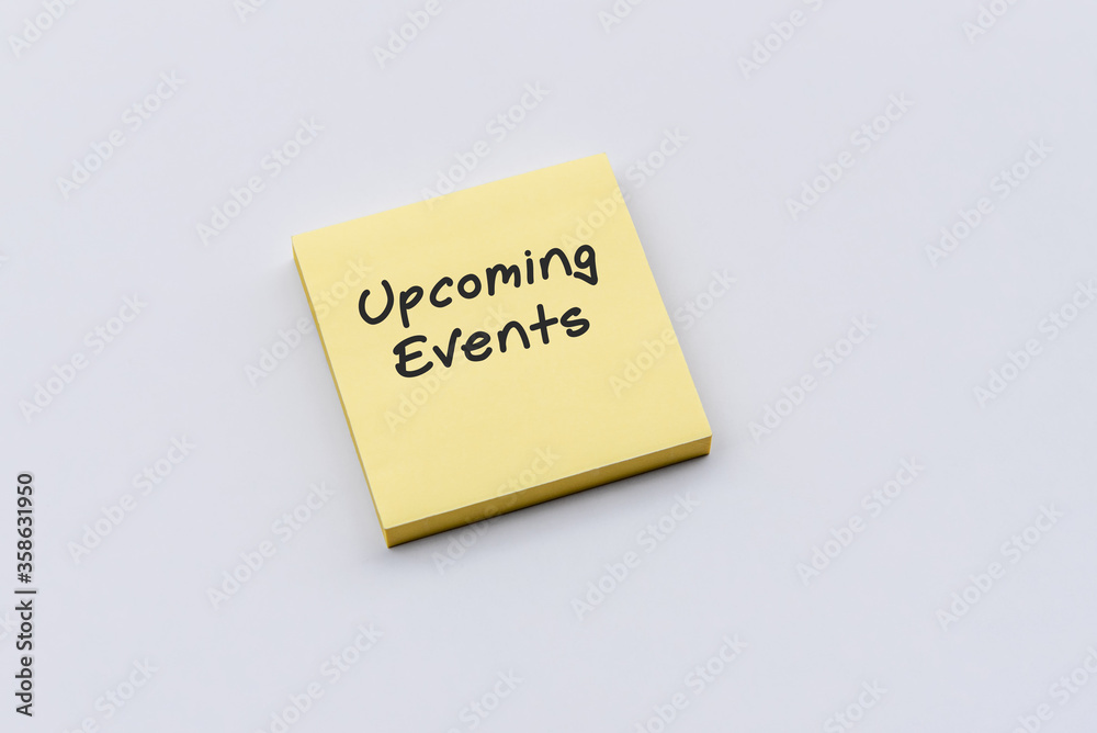 Upcoming events text on sticky paper post note Upcoming events text on sticky paper post note