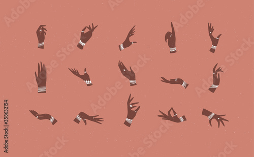 Hand with bracelets, rings in various positions coral