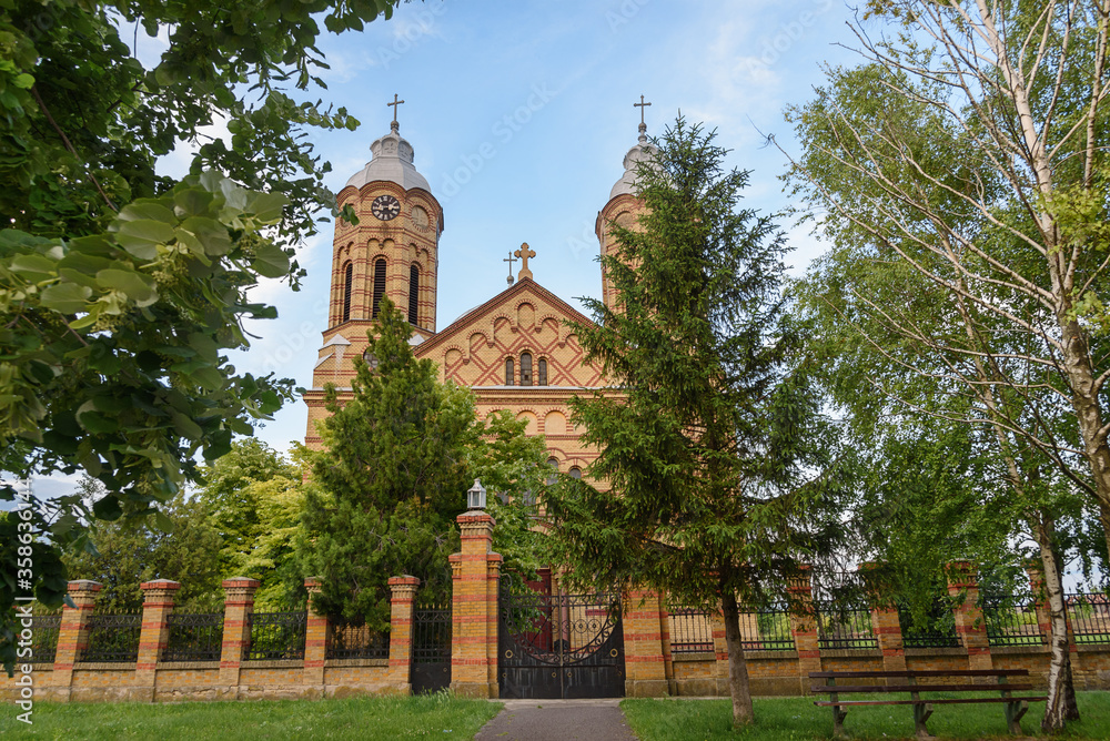 Fototapeta premium Uzdin, Serbia - June 04, 2020: The Romanian Orthodox Church of St. George in Uzdin, a place in the municipality of Kovacica, built in 1801.