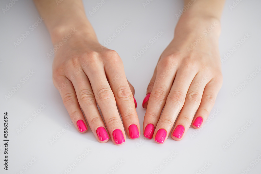 Beauty and skin care concept, close-up. Beautiful female hands and beautiful manicure on a white background. Beauty and skin care concept, close-up. Beautiful female hands and beautiful manicure on a white background.