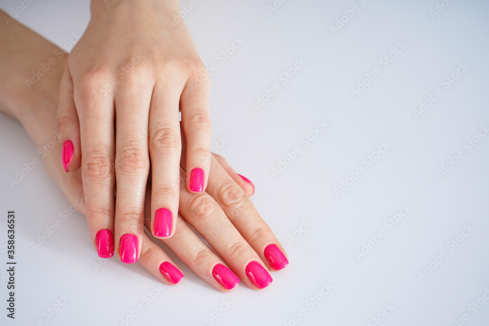 Beautiful female hands. Beautiful manicure on a white background. Beauty and skin care concept with space for text. Beautiful female hands. Beautiful manicure on a white background. Beauty and skin care concept with space for text.