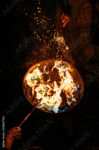 Burning fire with sparks in a fire pit