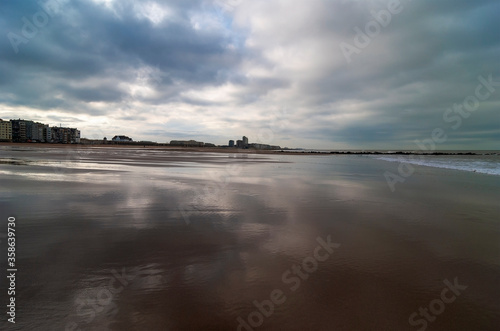 A dark sky by the beach of Oostende  Ostend in English   North Sea Coast  Belgium.