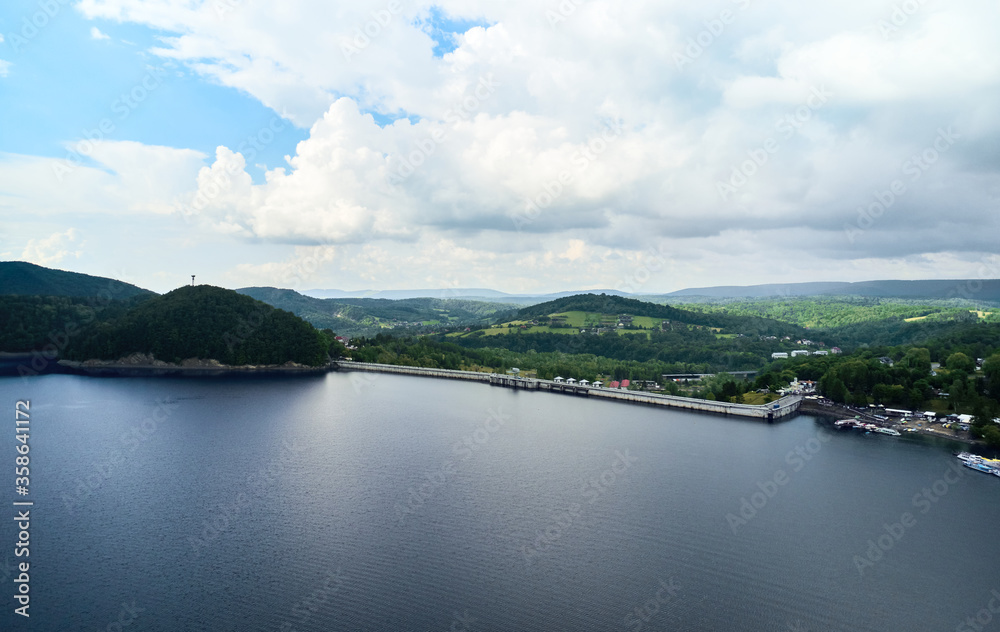 The Solina Dam aerial view, largest dam in Poland located on lake Solina. Hydroelectric power plant in Solina of Lesko County in the Bieszczady Mountains area of south-eastern Poland.