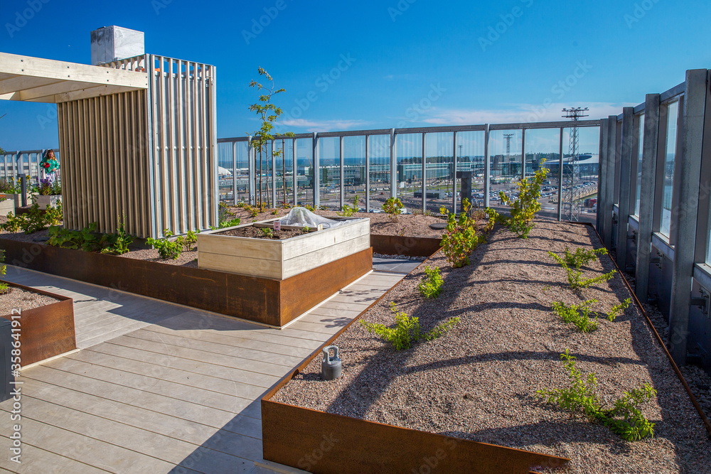 Garden on the roof - residential building close to Helinki port and Baltic Sea
