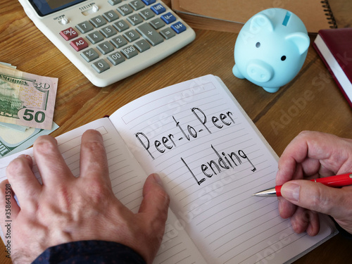 Peer-to-Peer P2P Lending is shown on the conceptual business photo photo