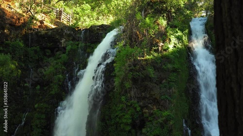 Meditation concept, stunning scenery of a relaxing waterfall, sounds of flowing water