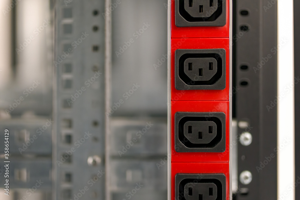 Electicity sockets (IEC 60320 C13) in the server rack.