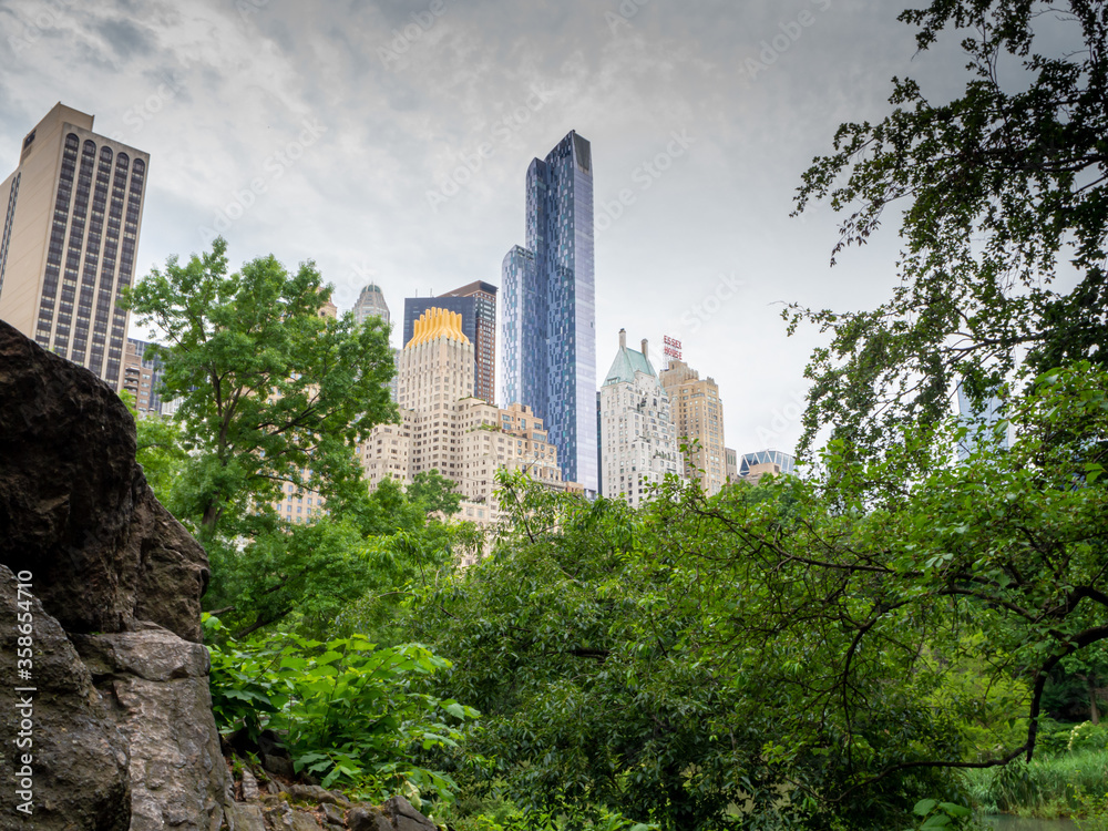 New York uptown skyscrapers viewed from Central Park in late spring