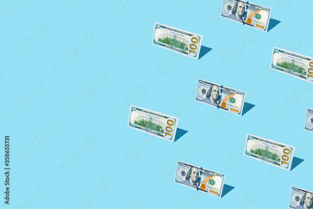 100 dollar bill izometric pattern on bright light blue background. Minimal flat lay texture. Abstract trendy fresh concept. 100 dollar bill izometric pattern on bright light blue background. Minimal flat lay texture. Abstract trendy fresh concept.