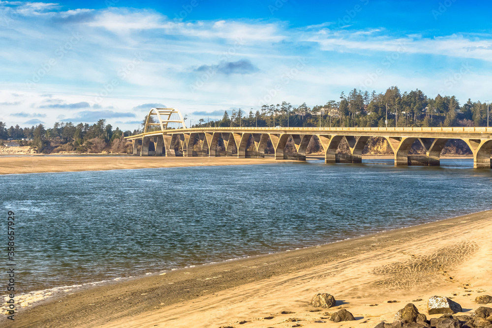 Fototapeta premium Alsey Bay concrete arch bridge in Waldport, Oregon. Opened in 1936