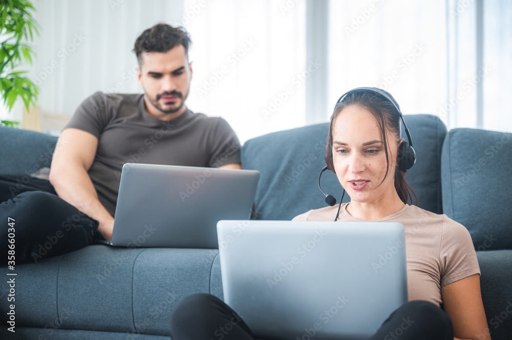 work from home concept, New normal ways of life couples working from the bedroom at home. Working guidelines for preventing the spread of the virus work from home concept, New normal ways of life couples working from the bedroom at home. Working guidelines for preventing the spread of the virus