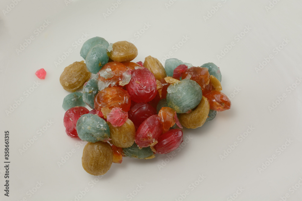 Hard candy suckers melted together due to heat and improper packaging or shipping Hard candy suckers melted together due to heat and improper packaging or shipping