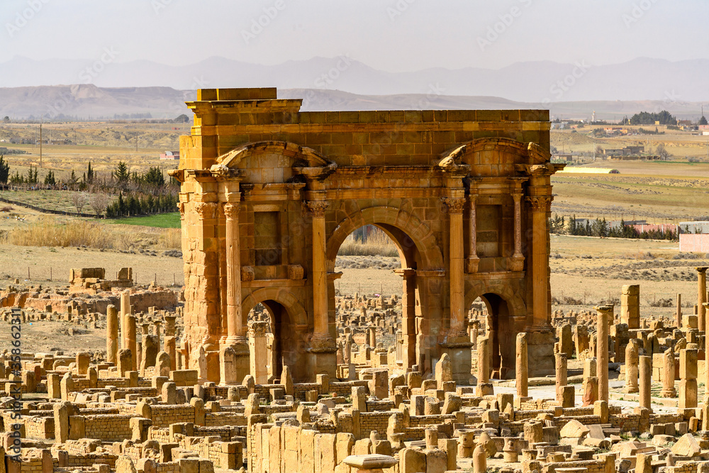 Trajan's Arch of Timgad, a Roman-Berber city in the Aures Mountains of Algeria. (Colonia Marciana Ulpia Traiana Thamugadi). UNESCO World Heritage Site