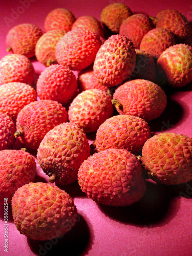 Lychees on pink