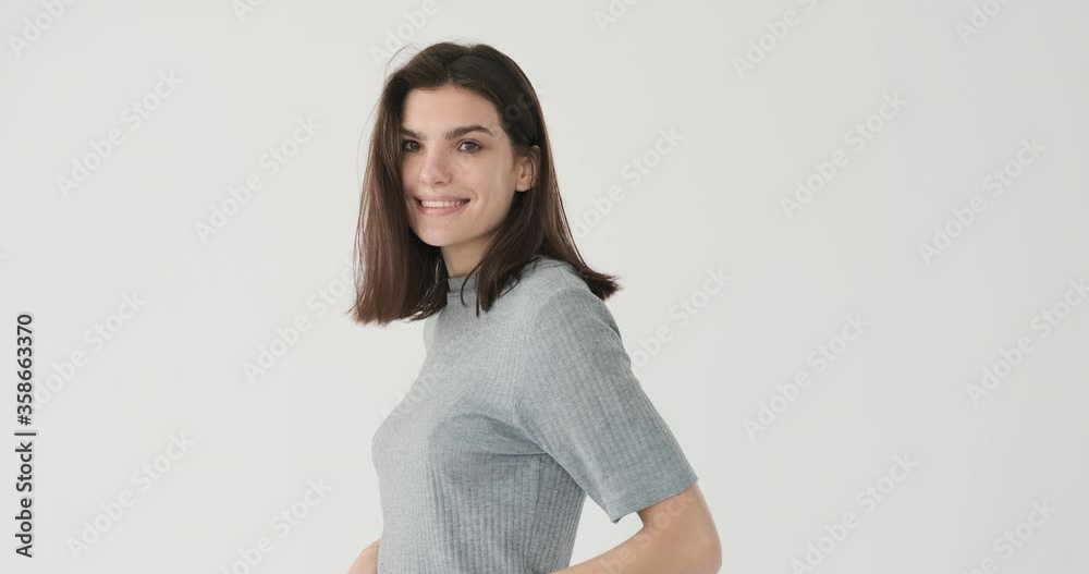 Portrait of beautiful woman posing over white background Portrait of beautiful woman posing over white background