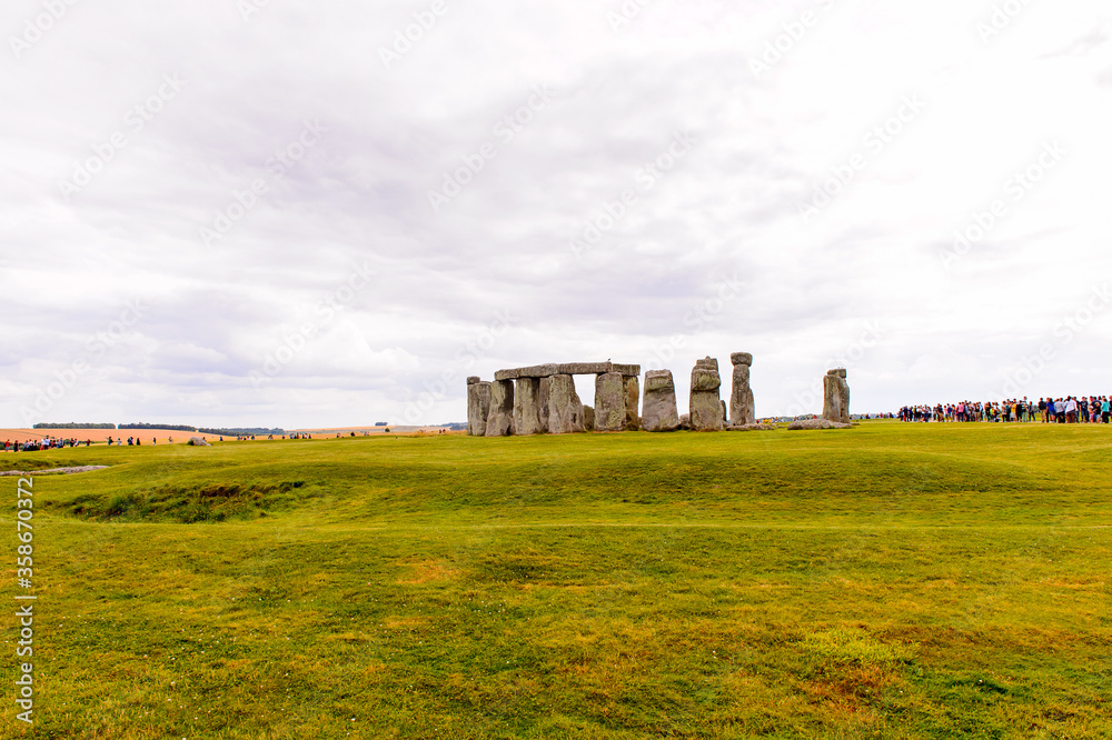Cloudy sky over the Stonehenge, a prehistoric monument in Wiltshire, England. UNESCO World Heritage Sites