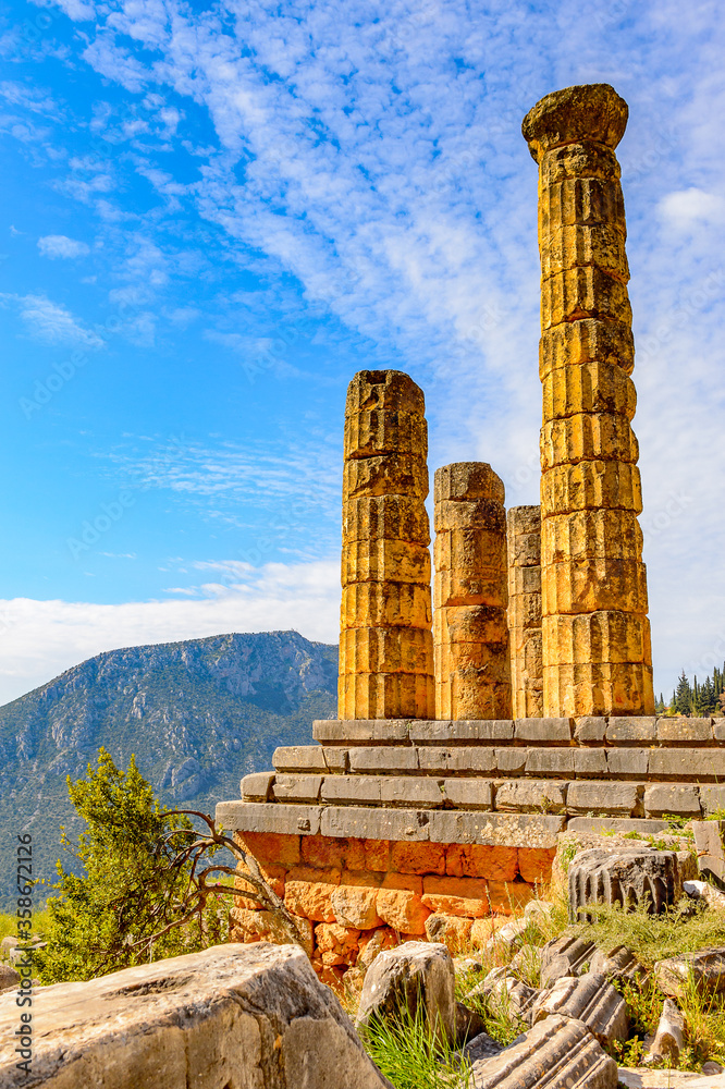 It's Apollo Temple in Delphi, an archaeological site in Greece, at the Mount Parnassus. Delphi is famous by the oracle at the sanctuary dedicated to Apollo. UNESCO World heritage It's Apollo Temple in Delphi, an archaeological site in Greece, at the Mount Parnassus. Delphi is famous by the oracle at the sanctuary dedicated to Apollo. UNESCO World heritage