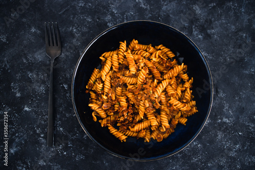 plant-based food, vegan fusilli pasta with lentil sauce