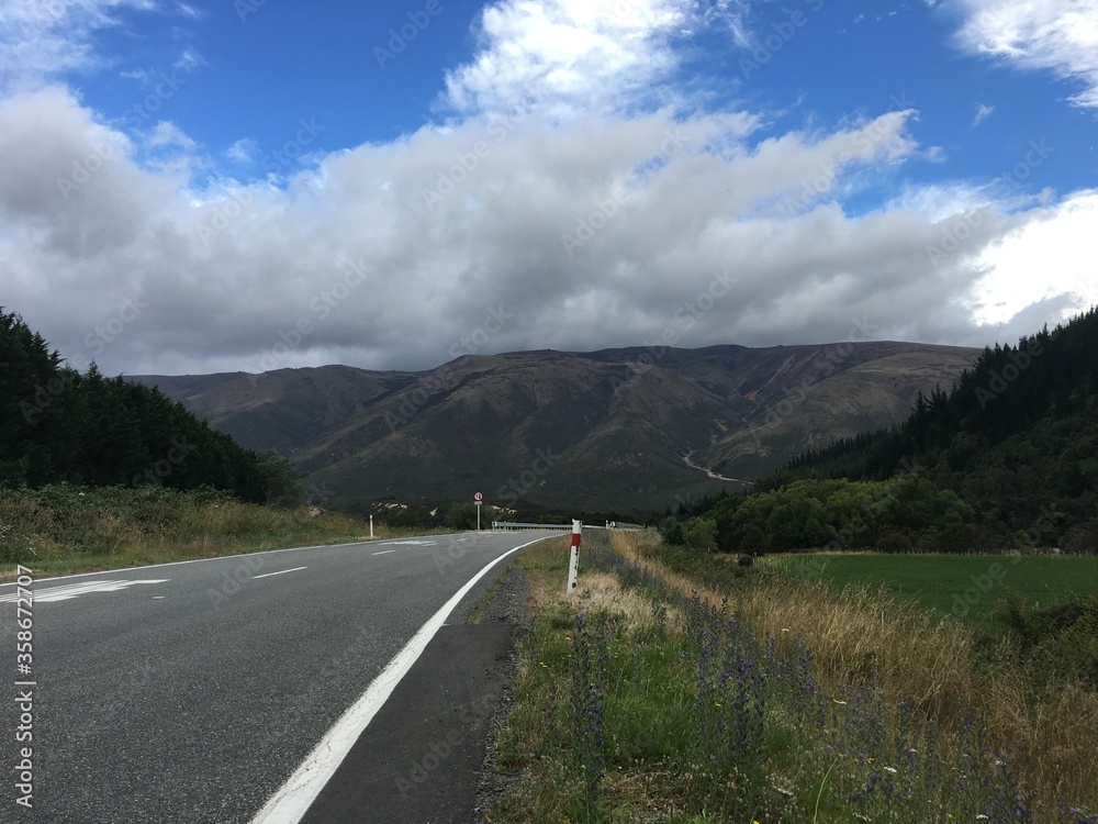 Naklejka premium road walking and sky