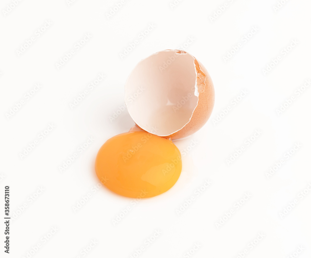 Raw chicken egg and yolks isolated Raw chicken egg and yolks isolated