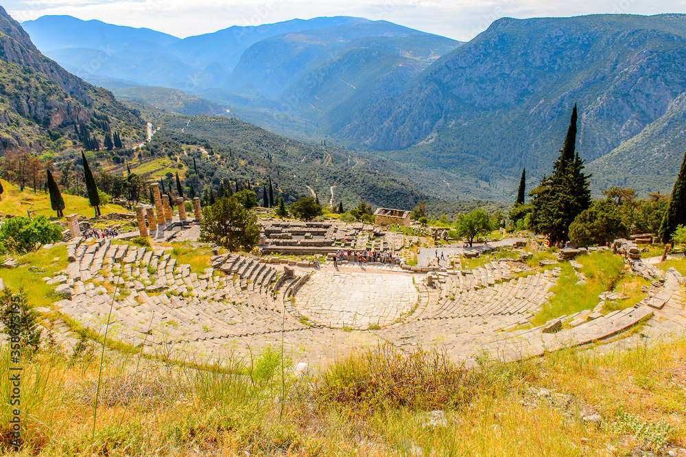It's Amphitheater in Delphi, an archaeological site in Greece, at the Mount Parnassus. Delphi is famous by the oracle at the sanctuary dedicated to Apollo. UNESCO World heritage