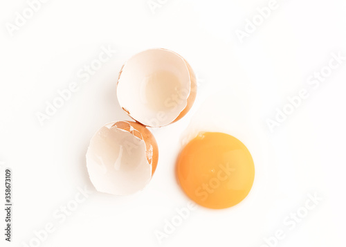 Raw chicken egg and yolks isolated
