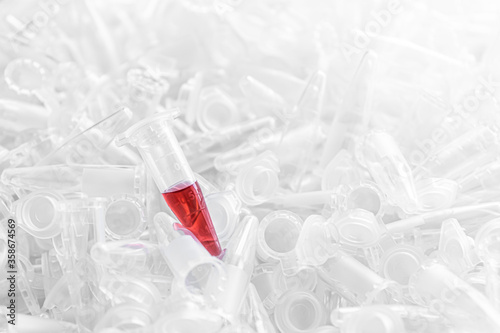 Wallpaper Mural Empty 1.5 ml microcentrifuge tubes with one red sample Torontodigital.ca