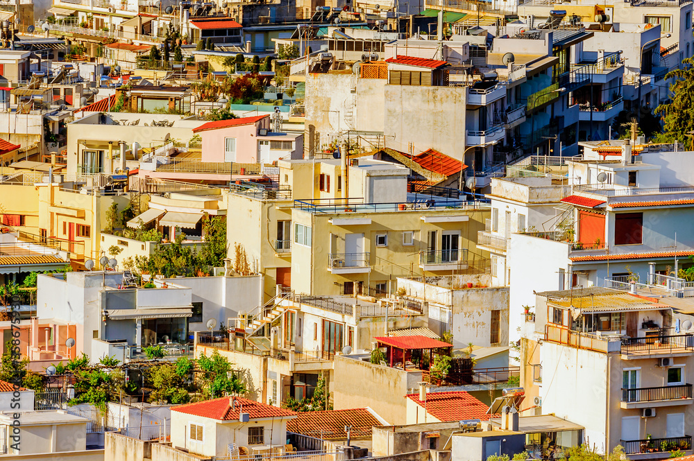 It's Aerial view of houses in Athens, the capital of Greece.