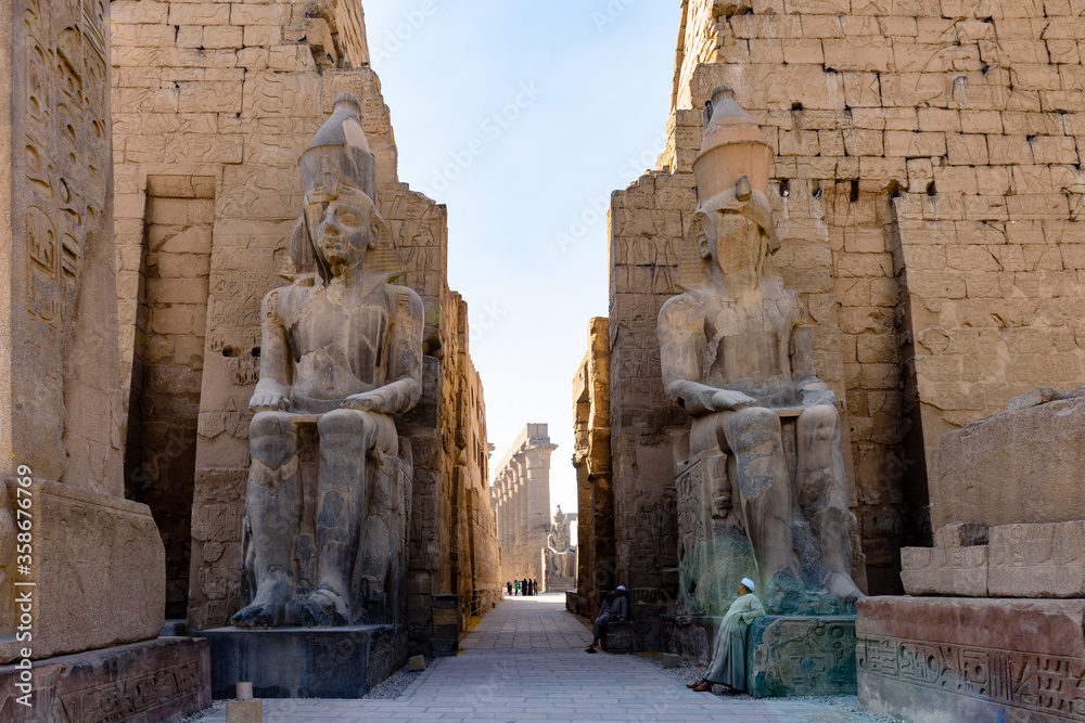 It's Colossus inside Luxor Temple, a large Ancient Egyptian temple, East Bank of the Nile, Egypt. UNESCO World Heritage