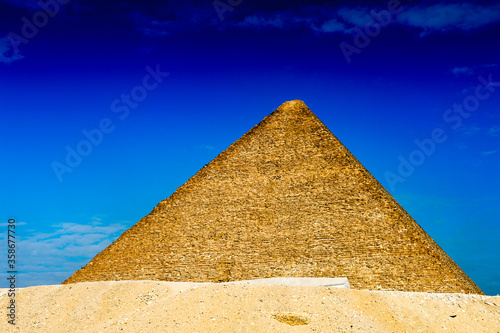 It s Great Pyramid of Giza  Pyramid of Khufu or the Pyramid of Cheops   the oldest and largest of the three pyramids in the Giza Necropolis  the oldest one of the Seven Wonders of the Ancient World