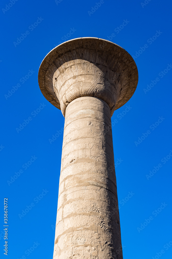 It's Karnak temple, Luxor, Egypt (Ancient Thebes with its Necropolis), the main place of worship of the eighteenth dynasty Theban Triad with the god Amun as its head.