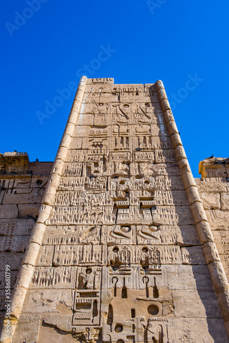 It's Wall of the Medinet Habu (Mortuary Temple of Ramesses III), West Bank of Luxor in Egypt. photo