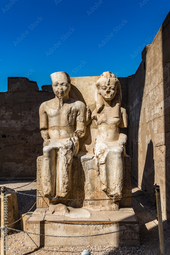 It's Colossus inside Luxor Temple, a large Ancient Egyptian temple, East Bank of the Nile, Egypt. UNESCO World Heritage It's Colossus inside Luxor Temple, a large Ancient Egyptian temple, East Bank of the Nile, Egypt. UNESCO World Heritage