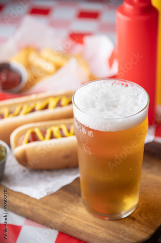 hot dog with beer and french fries