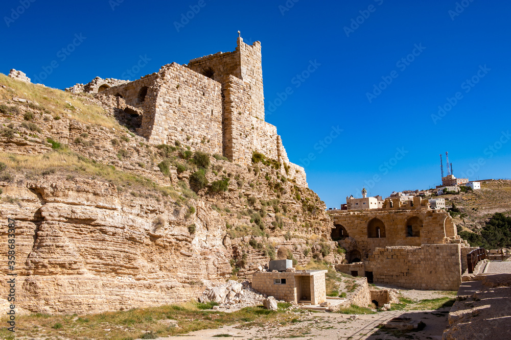 It's Kerak Castle, a large crusader castle in Kerak (Al Karak) in Jordan.