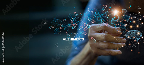 Alzheimer's disease and dementia, memory loss, Elderly female hand holding a jigsaw puzzle with icon medicine brain, and healthcare on dark background.