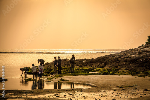Beautiful silhouette of young people in the Chura Sea in Okinawa_03