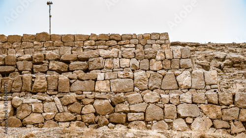 It's Stone wall in the ancient city of Persepolis, Iran. UNESCO World heritage site photo