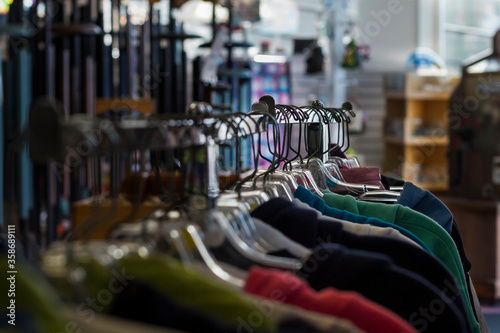 Hangers with the clothes in a retail place