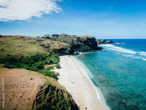 Beautiful view of surrounding beaches from Merese Hill viewpoint in Lombok Island, Indonesia photo