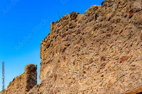 It's Destroyed architecture of Pompeii, an ancient Roman town destroyed by the volcano Vesuvius. UNESCO World Heritage site